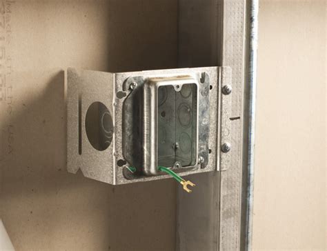 video for securing ceiling electrical box to metal studs|how to mount an electrical box.